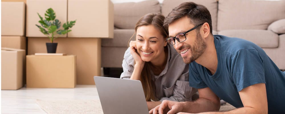 Happy Couple Researching | Financial Information | Tiger Finance