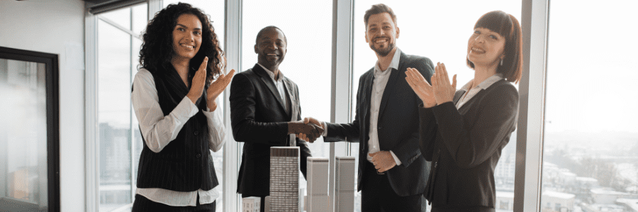 Multiethnic businesspeople, real estate, agents, developers, handshake after successful deal
