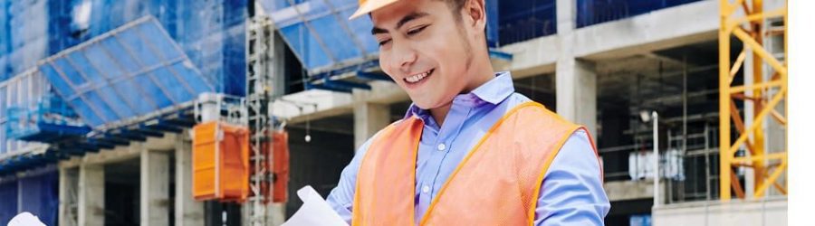 Construction engineer examining a blueprint | Financial Information |Tiger Loans