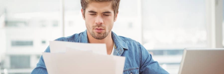 Self-employed man checking his credit score | Financial Information | Tiger Finance
