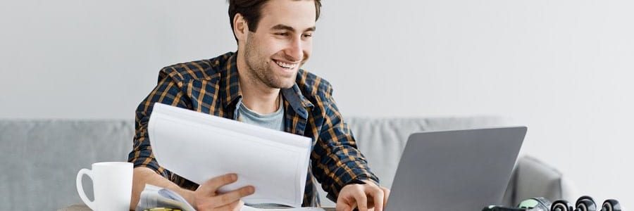 Man applying for a construction loan online | Financial Information | Tiger Finance